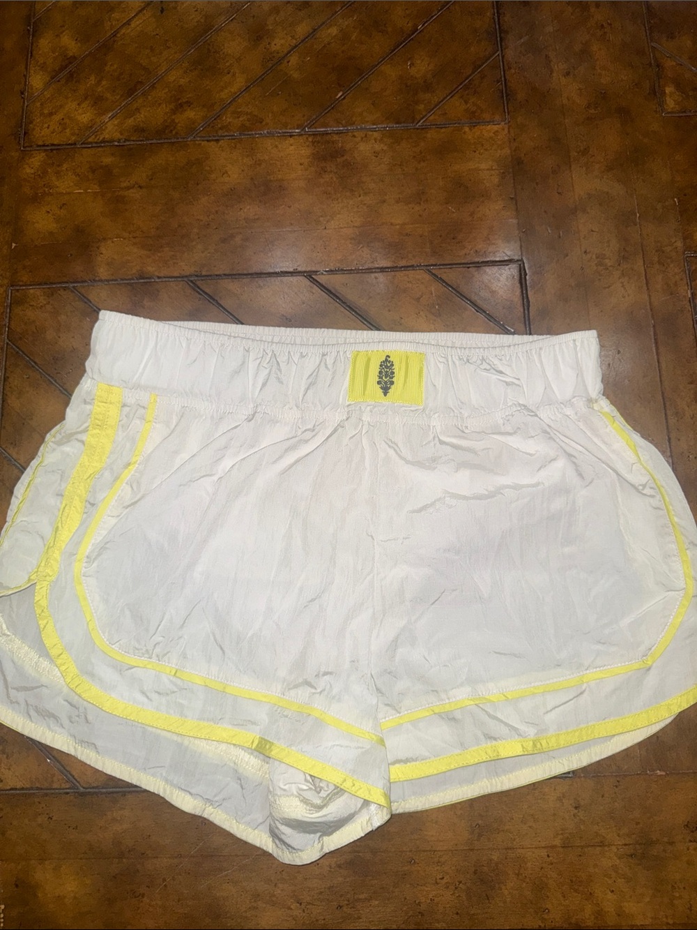 FP Movement White Women's Athletic Shorts with Yellow Trim